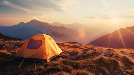 Camping tent high in the mountains. tourist tent camping in mountains at sunset