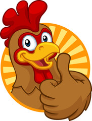 A chicken cartoon rooster cockerel character mascot giving a thumbs up. © Christos Georghiou
