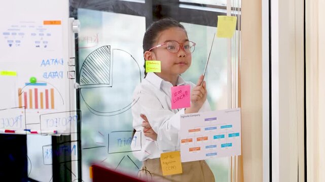 Young Asian Girl Prodigy Giving Business Presentation in Modern Office