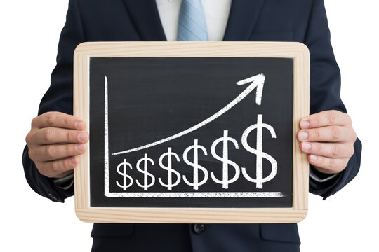 A businessman displays a chalkboard showing a graph of increasing financial growth.