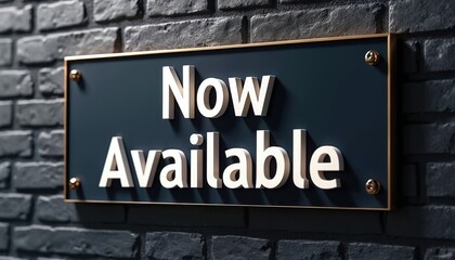 Fototapeta premium Stylish sign displays Now Available text. Mounted on dark brick wall. Clean modern design suits retail business offers or new product launch announcements.