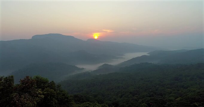 Aerial Sunrise Over Misty Mountains of Coorg Karnataka India