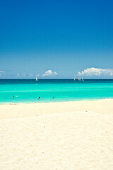 Fototapeta premium Varadero, Cuba; 04.07.2023. Beautiful, colourful sunset on the beach in Varadero, Cuba! Cote d'Azur of the Atlantic Ocean, next to the Caribbean Sea. Cuba wild palm beach background. Nature blue sea l