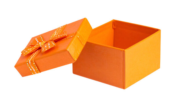 Open orange gift box with ribbon and partially open lid on a black background
