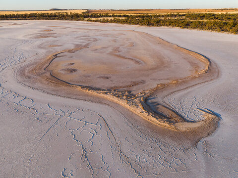 Aerial view of cracked earth patterns and sun-baked textures define the unique landscape of Lake Campion Nature Reserve, Lake Campion, Western Australia, Australia.