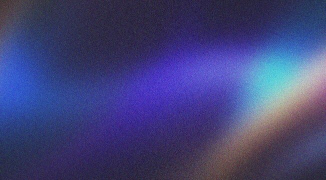 Diffuse blue and gold light spill on dark grainy background texture