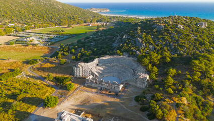 Gelemis, Turkey. Aerial view of Patara Ancient Theatre on slope of Kursunlu Hill, archaeological site with mediterranean landscape. Aerial View