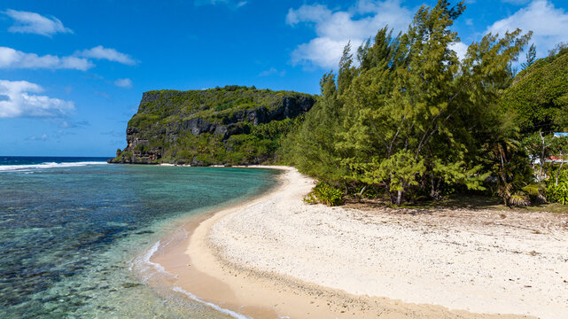 Aerial view of white sand beach on west coast of Rurutu French Polynesia