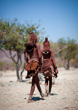 Himba tribe women covered with otjize, Cunene Province, Oncocua, Angola