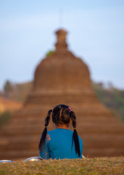 Girl in front of buddhist temple, Mrauk u, Myanmar