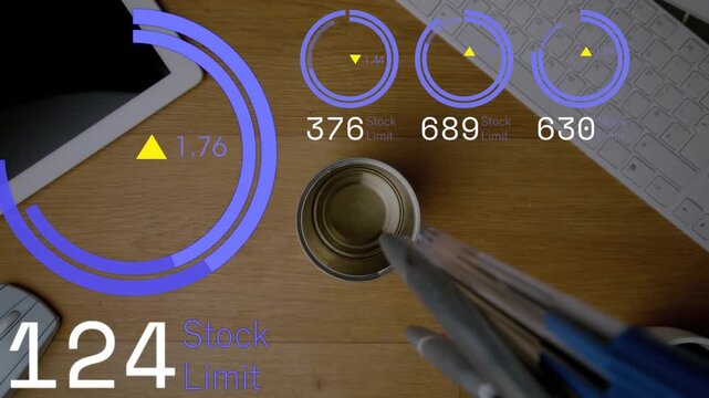 Responding to HUD rising stock values, bundle of pens replenishing metal pen holder on desk