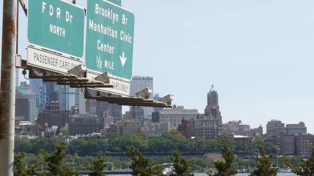 New York City Brooklyn Heights skyline from Manhattan, United States. Residential district near Dumbo and Brooklyn Bridge cityscape. Manhattan Civic Center road traffic sign. FDR Drive urban highway.