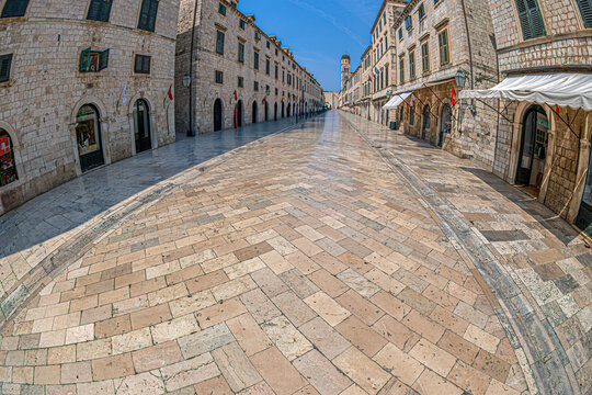DUBROVNIK, CROATIA - AUGUST 17, 2024: Stradun street, the main street limestone-paved pedestrian. From in the 13th century, runs some 300 metres through the Old Town, the historic part of the city.
