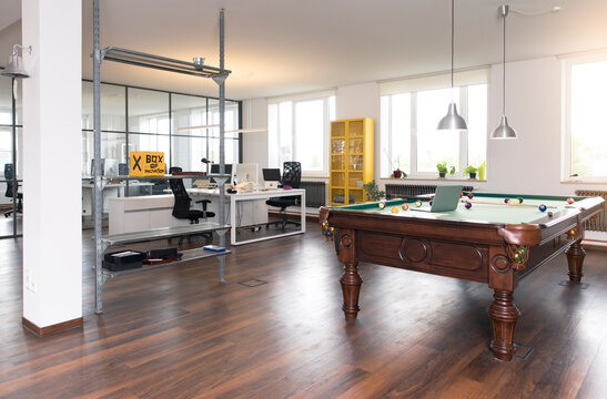 Pool table in modern open space office