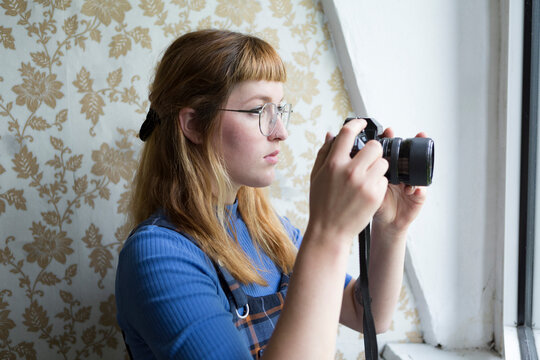 Female student using camera