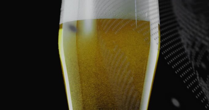 Pattern starting sweep right, pint glass holding amber beer, bubbles rising, pattern casting glow