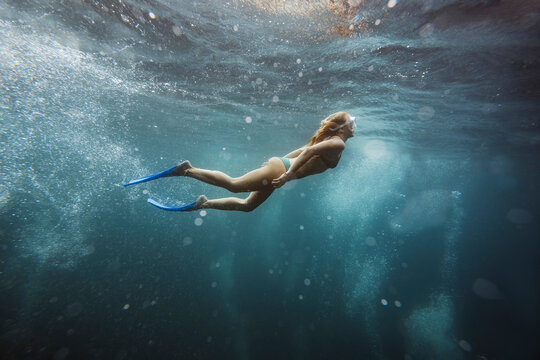 Woman underwater, Gili Meno, Gili islands, Bali, Indonesia