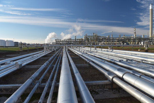 pipelines and buildings of a refinery - industrial plant for fuel production