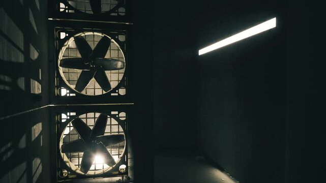 Cinematic industrial passage with large fans, sharp geometry, high contrast lighting and metallic textures showcasing minimalist composition