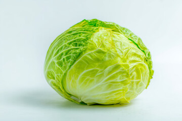 Fototapeta premium Whole green cabbage on a clean white seamless background for food packaging and vegetable product design