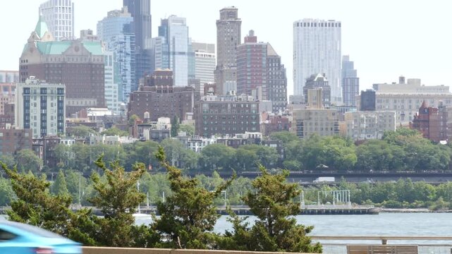 New York City Brooklyn Heights skyline from Manhattan, United States. Riverfront residential district near Dumbo and Brooklyn Bridge cityscape. Waterfront building architecture. FDR drive road highway