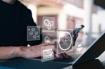 Time Management and Productivity Optimization Concept. Business professional using laptop with...