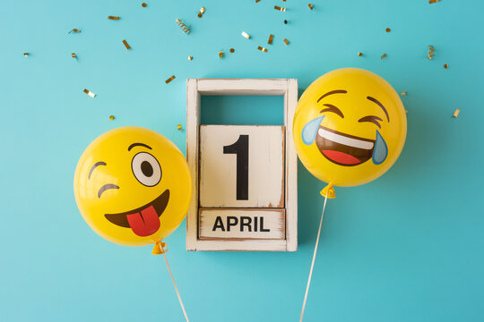 April Fools' Day celebration with laughing emojis and calendar