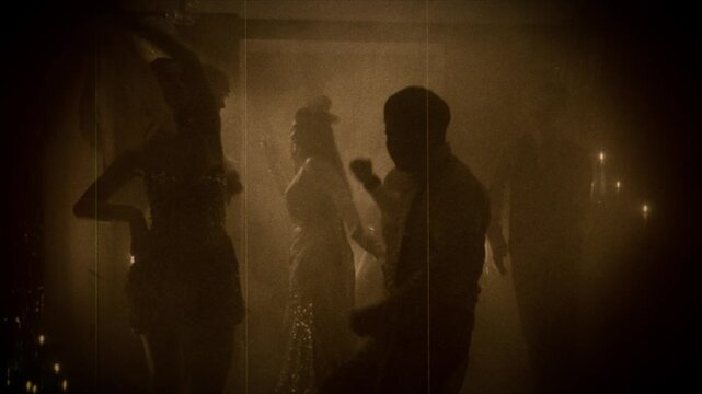 Dark silhouette group of people dancing 1920s old style sepia color film. flapper woman with man couple dance in crowd have fun joy retro party dark night club roaring twenties expression celebration