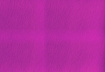 Vibrant magenta textured paper background with rough granular surface