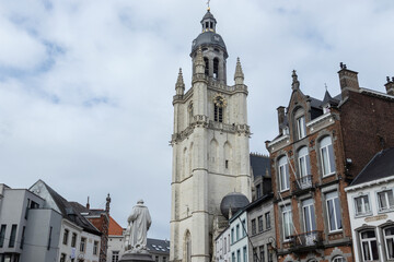 View of St. Martins Basilica, the 19th century Godebski statue, and buildings on the Grote Markt in Halle, Flemish Brabant, Belgium. Copy space above left.