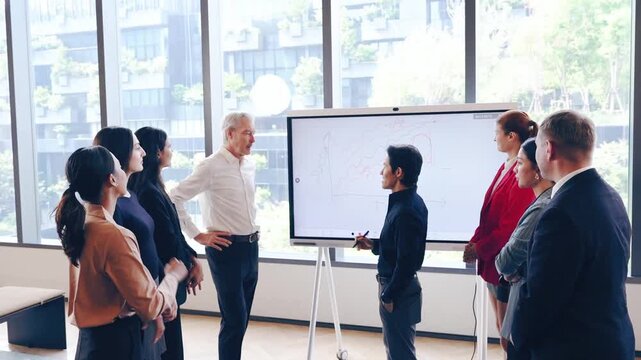 Business meeting presentation office with teamwork and collaboration featuring diverse group discussion using whiteboard for professional strategy, leadership, planning, and brainstorming