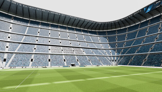 Wide angle view of empty soccer stadium with green field and stands