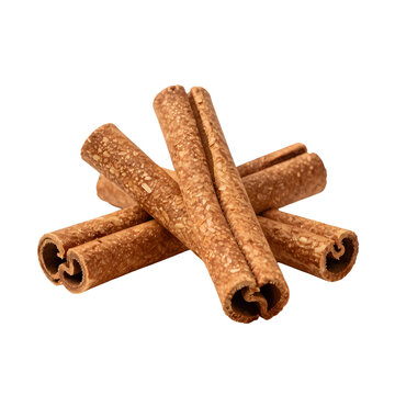 Close up shows cinnamon sticks stacked on top of each other against white backdrop