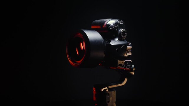 vertical video new electronic gyroscopic stabilizer for small SLR and mirrorless cameras and still cameras controlled via smartphone or joystick