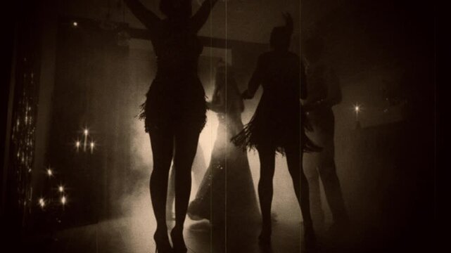 old-fashioned sepia color film group people dancing crowd enjoying time in dark night club. retro lady flapper men and women have fun, dance floor old style party new year roaring twenties 1920's era