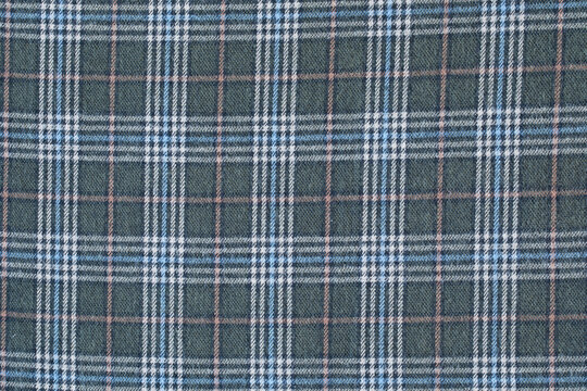 Chequered material pattern close up