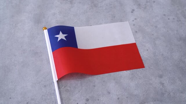 Flag of Chile with grey background. Concept of sout american country.