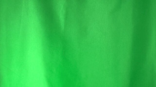 Index finger raising up for double click. Hand gesture, sign. Close-up on chromakey green background.