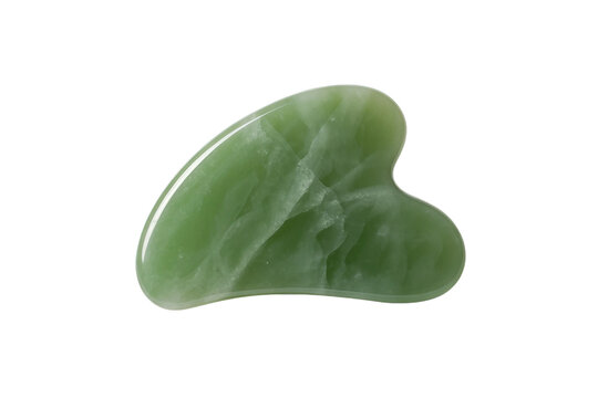 Green jade gua sha stone for facial massage and skin care treatment isolated on transparent background for beauty and wellness.