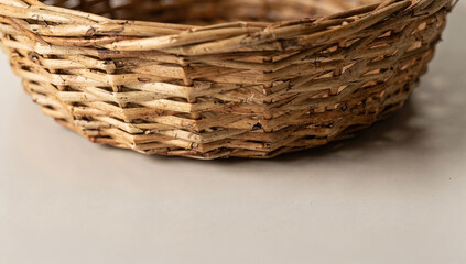 Woven basket on a flat surface with a simple design for farm use or decoration