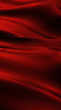 Abstract flowing red fabric with smooth waves and dark shadows