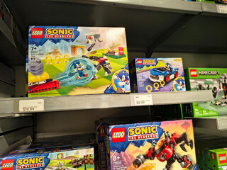 Fototapeta premium LEGO Sonic the Hedgehog and Minecraft toy sets on retail store shelf display