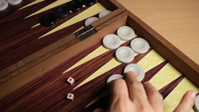 Slow Motion Close-up of Rolling Backgammon Dice in Mid-Air, Gaming Action