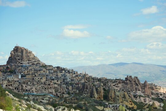 Wide angle of vew of Cappadocia with the unique rock formations and valleys in the background.