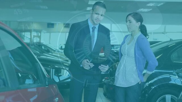 Animation of scope scanning over caucasian woman with businessman in car salon