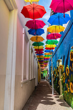 A view up the Umbrella Street in the Punda district in Willemstad, Curacao on a bright morning