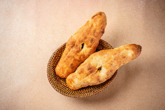 Fresh georgian bread shot on rustic background