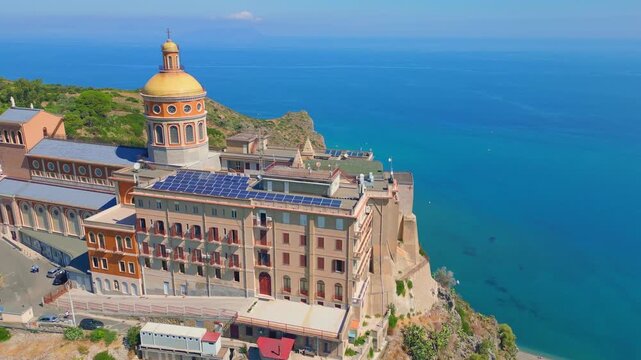 Aerial drone view of the Sanctuary of Tindari in Sicily, overlooking the stunning Mediterranean coast and lagoons. A breathtaking blend of history, faith, and Sicilian landscape from above.
