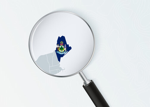 Maine Map Under Magnifying Glass with National Flag Overlay.