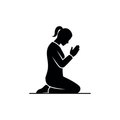 Silhouette of a woman kneeling in prayer a symbol of faith and devotion.